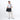Woman wearing a Sherpani Jaunt Raven Black Garment Duffle by the crossbody strap against white backdrop #color_raven-black