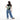 Woman wearing a Sherpani Esprit Olivine Sling on her back against white backdrop. #color_olivine-green